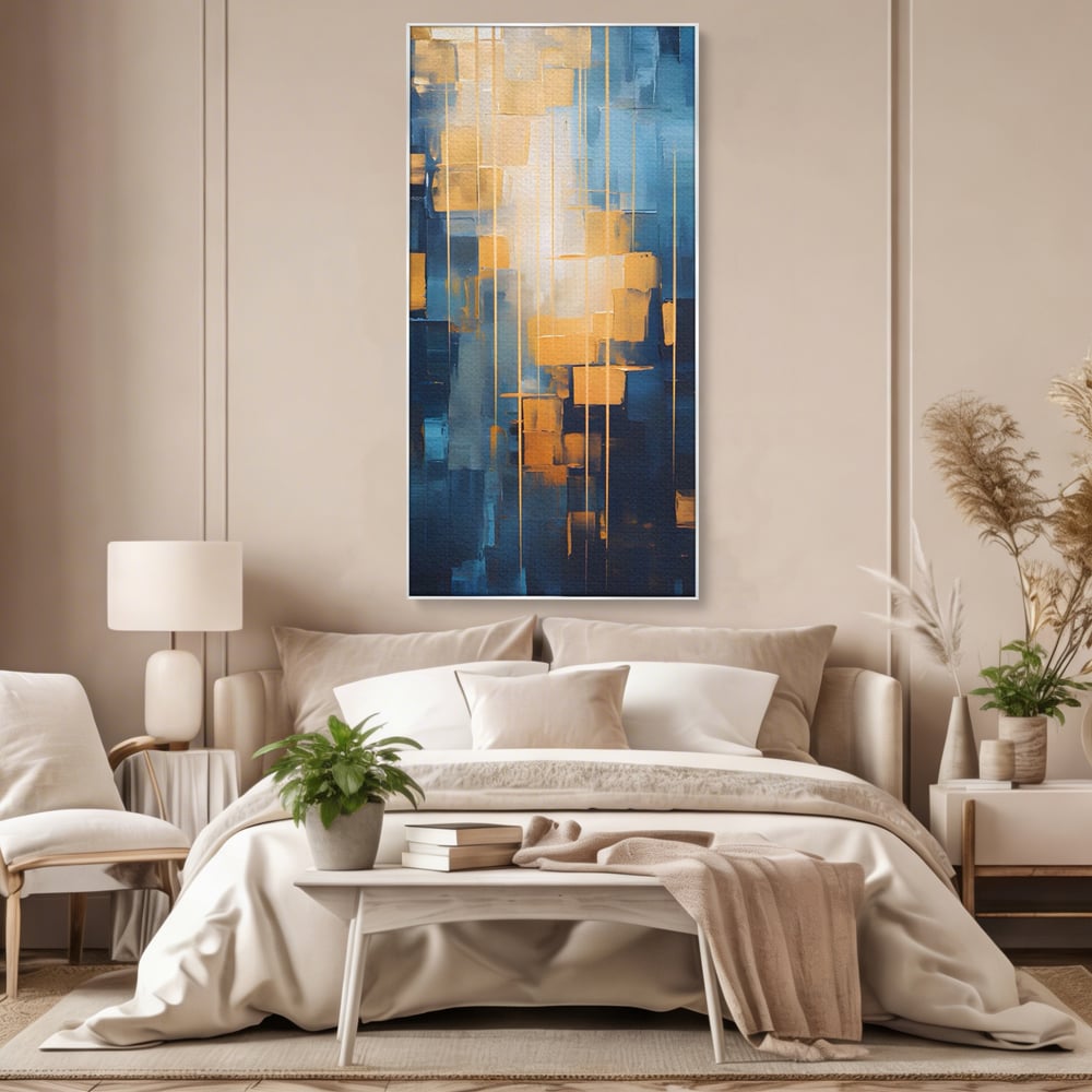 Tablou canvas cu pictura abstracta cu linii aurii, in rama de aluminiu argintiu, pe perete intr-un dormitor